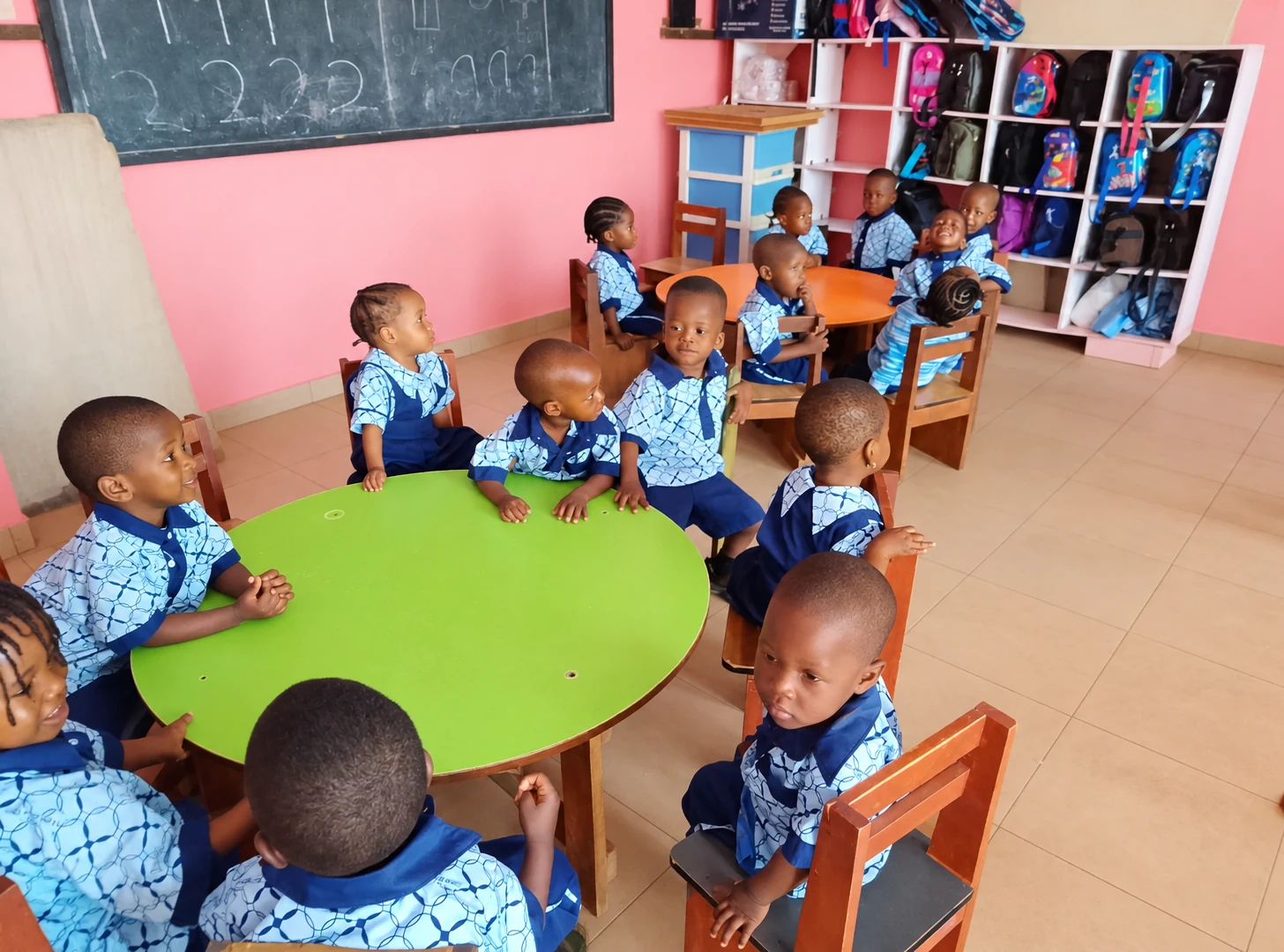 Living Spring Reception children gathered around activity tables