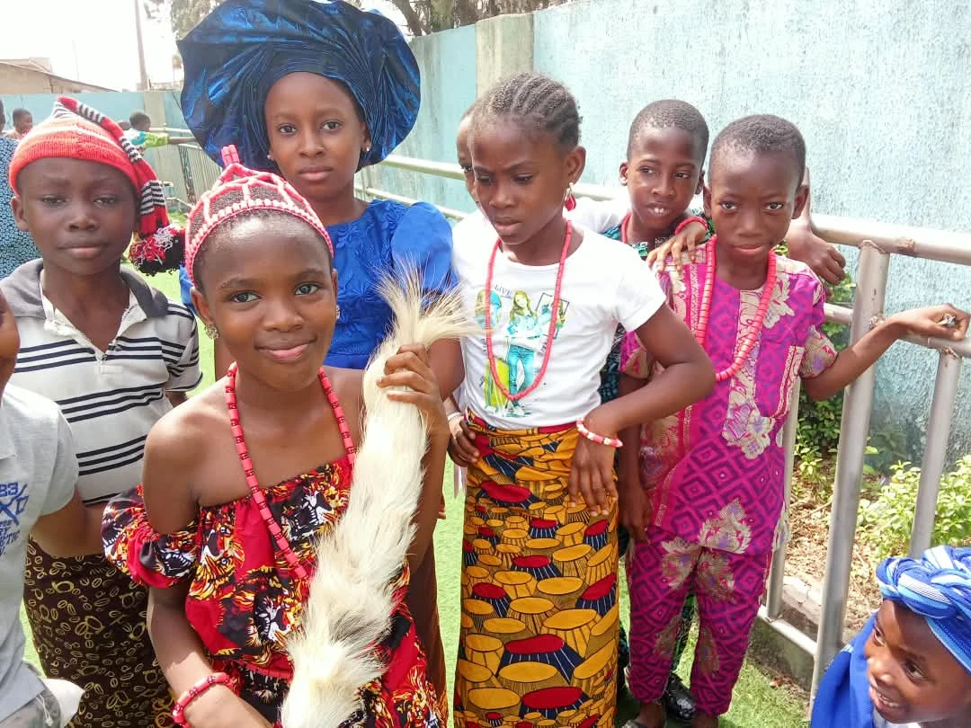 Students celebrating in traditional attire