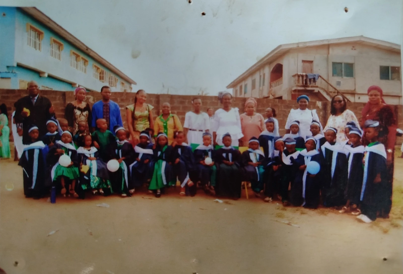 Pupils and adults at the July 2025 graduation ceremony